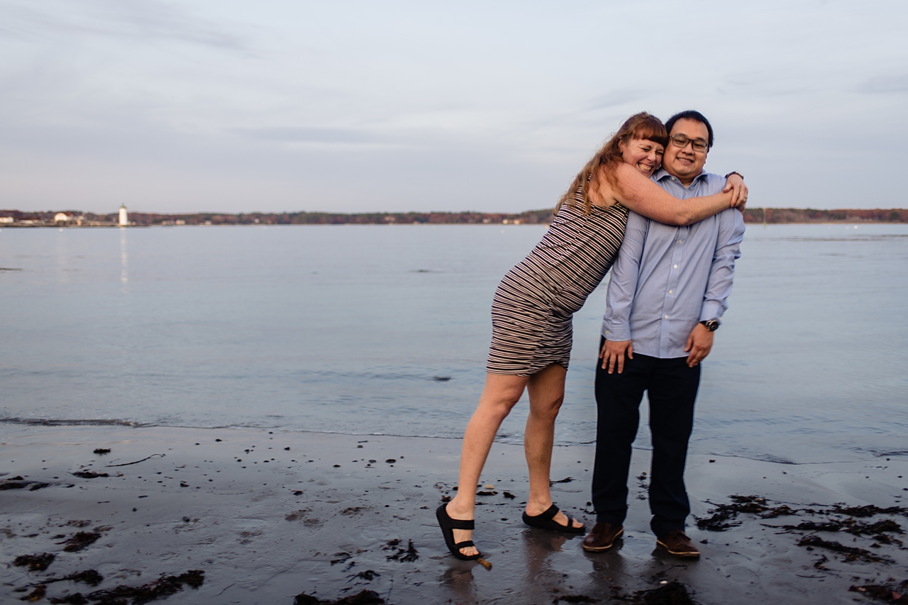 Silly engagement photo where woman ran over and hugged her fiance