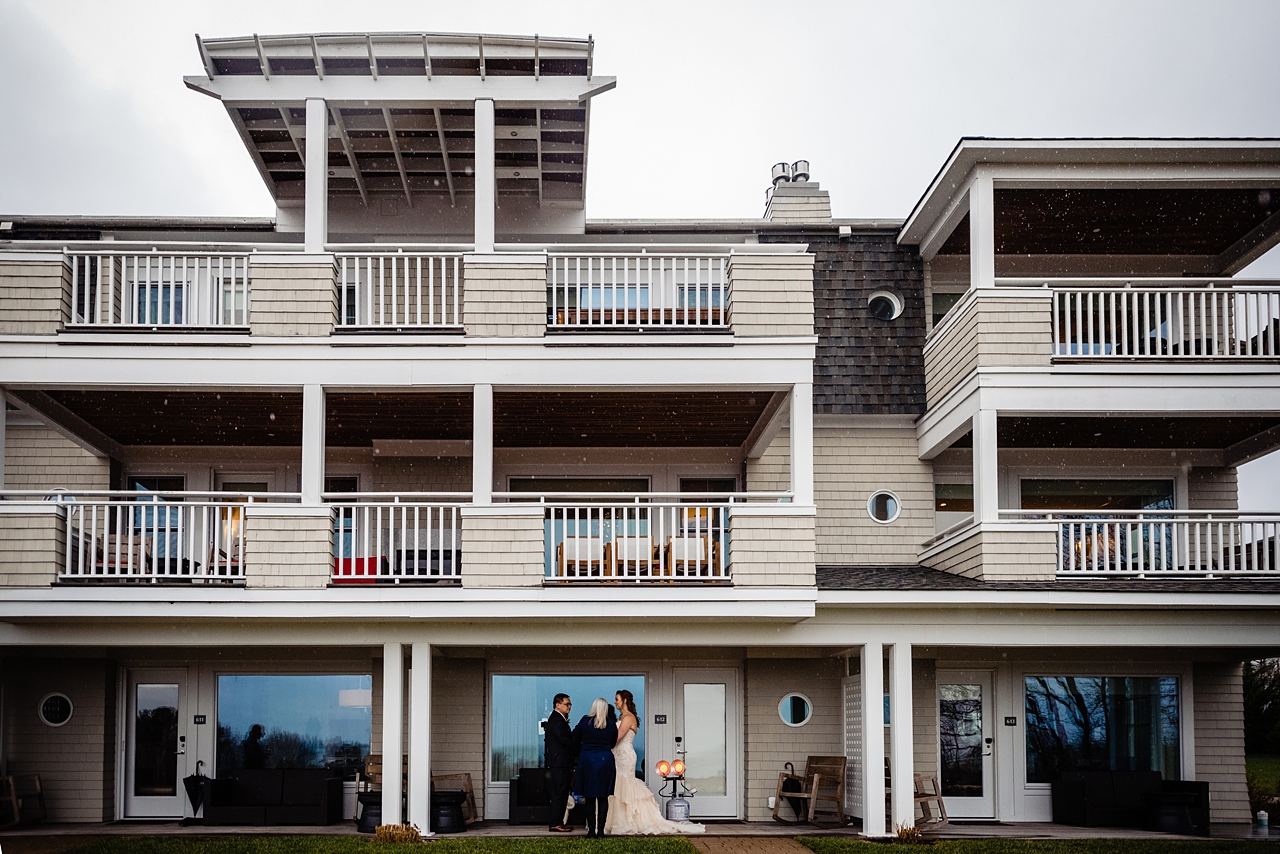 Image of small elopement zoomed way back so the ceremony is small in the frame.