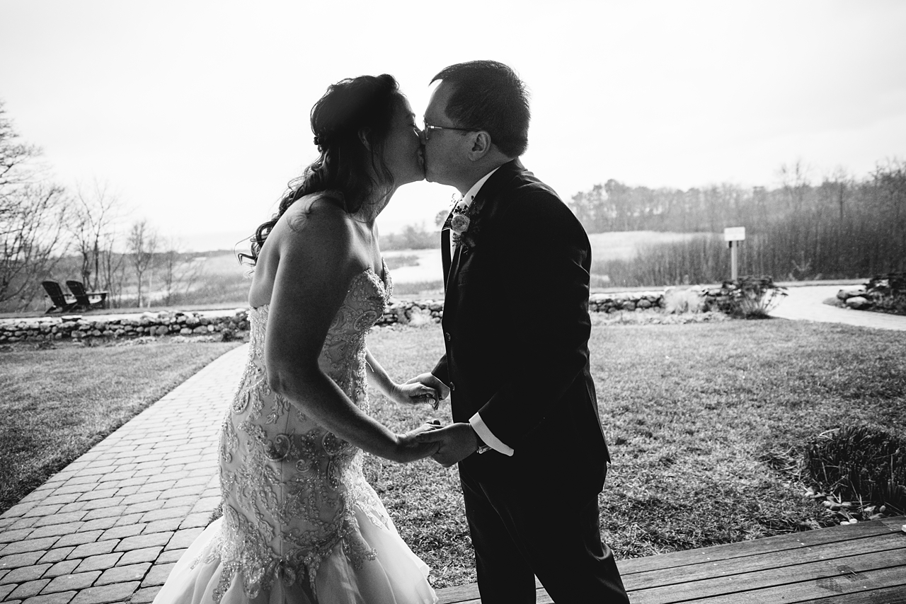 Black and white photo of the first kiss.